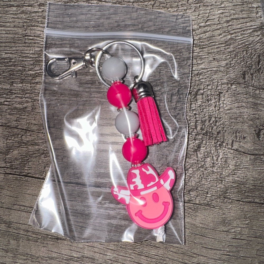 Pink and White Smiley Keychain with Tassel